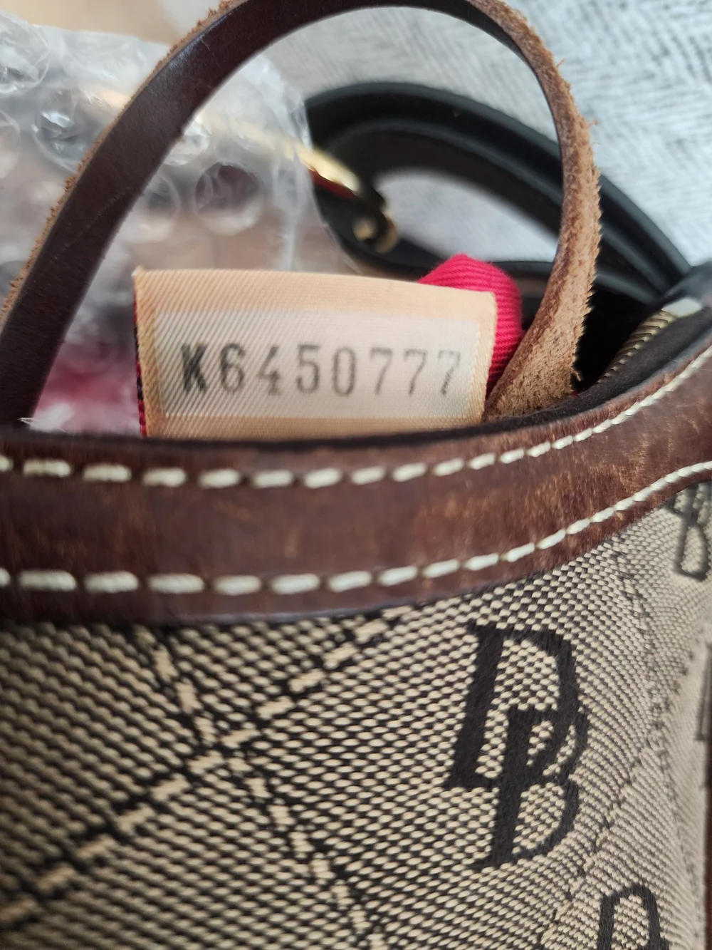 Dooney & Bourke Signature Monogram Canvas Hobo bag